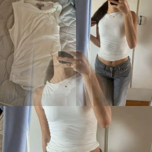 Tanktop med vriden detalj - Säljer denna toppen från H&M i storlek XS som är helt slutsåld. Den är endast testad annars helt oanvänd. Säljer den pga att jag tycker den sitter för tight på mig. Originalpris 179kr