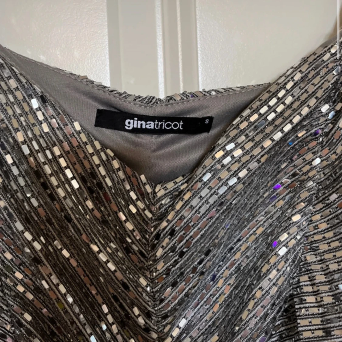 Glittrig klänning - 92