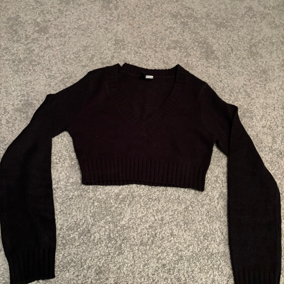 V ringad stickade topp från H&M 