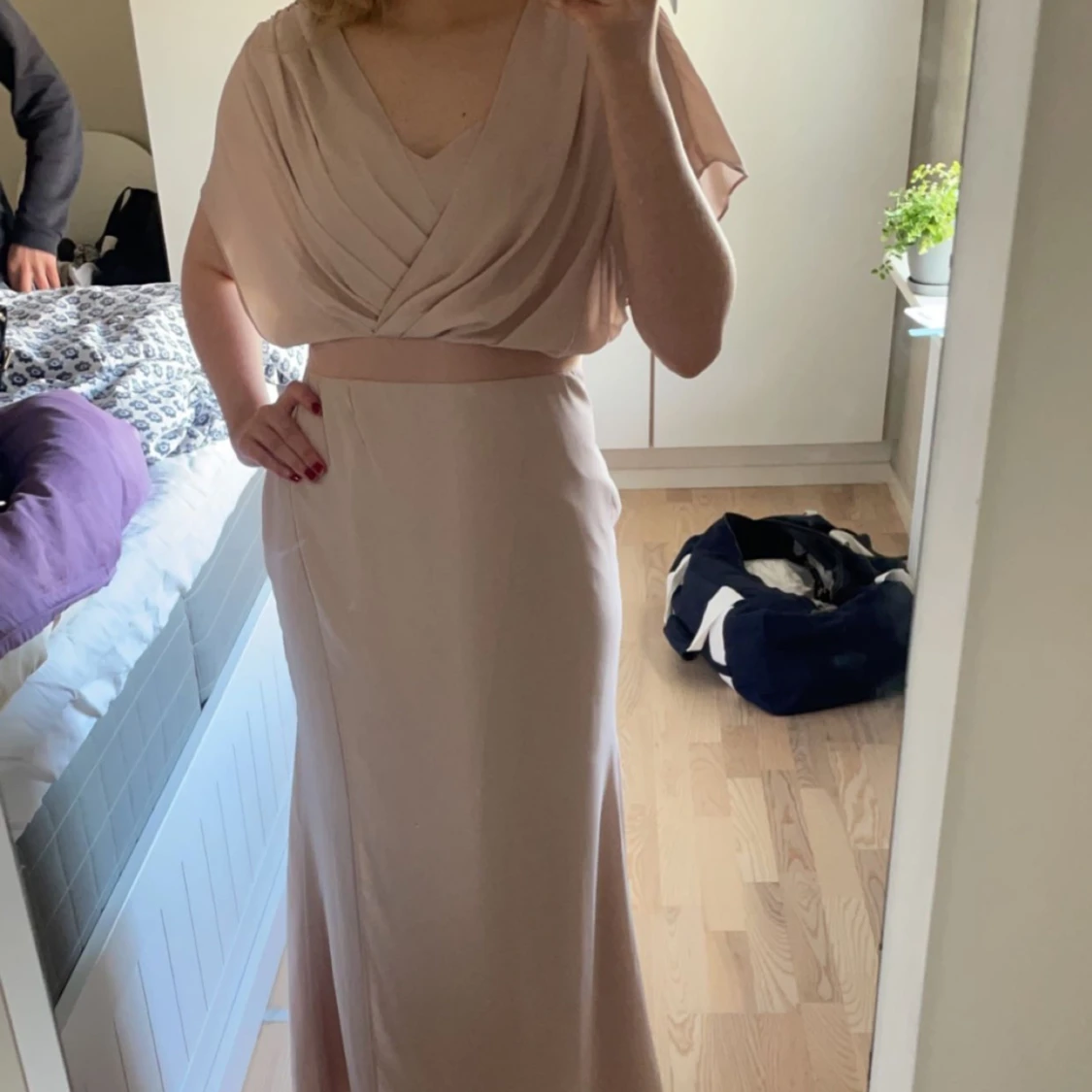 Lång ljusrosa klänning