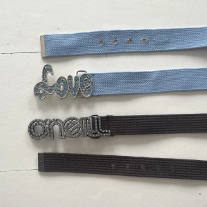 Bälten - Två bälten, ett från O’neill och ett utan märke som det står Love på:) Båda för 250 eller en av dem för 150!💕Blåa är 106cm och bruna är 110cm!