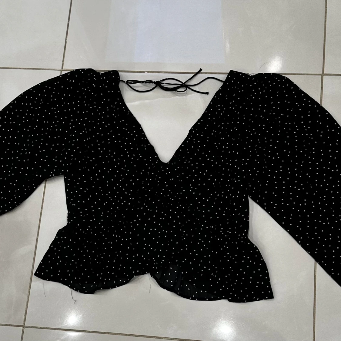 Prickmönstrad blus - 91