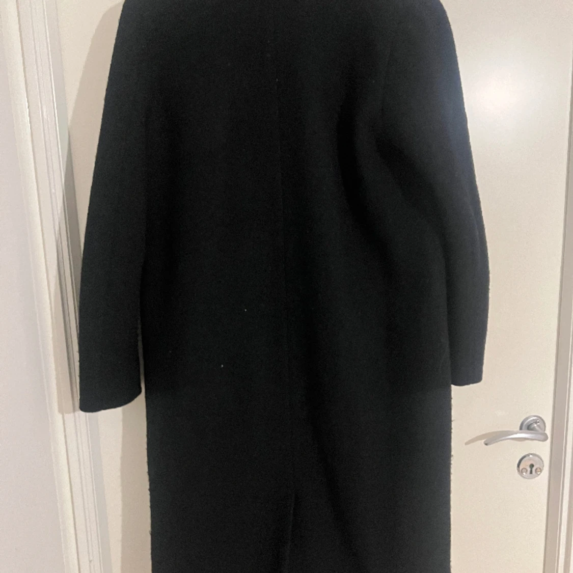 Monki svart rak kappa - 90