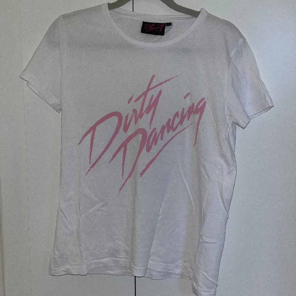 En Dirty Dancing t-shirt i storlek Xs. Aldrig använd🤍. T-shirts.