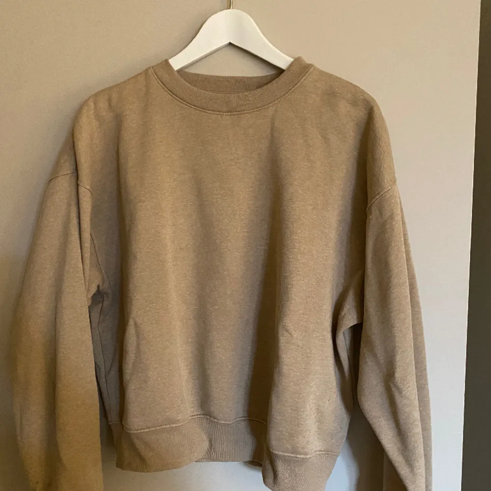 Beige sweatshirt . Hoodies.