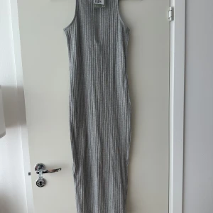Långklänning - Helt ny med etikett kvar.