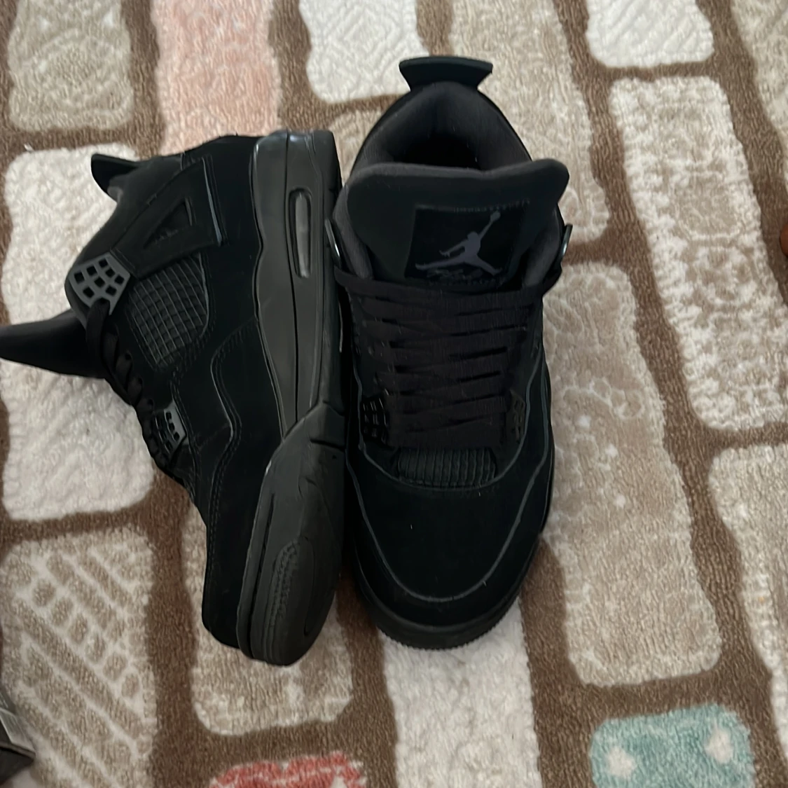 Jordan 4 black cat