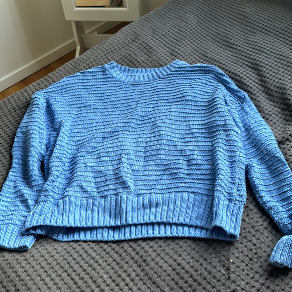 Blå stickad tröja