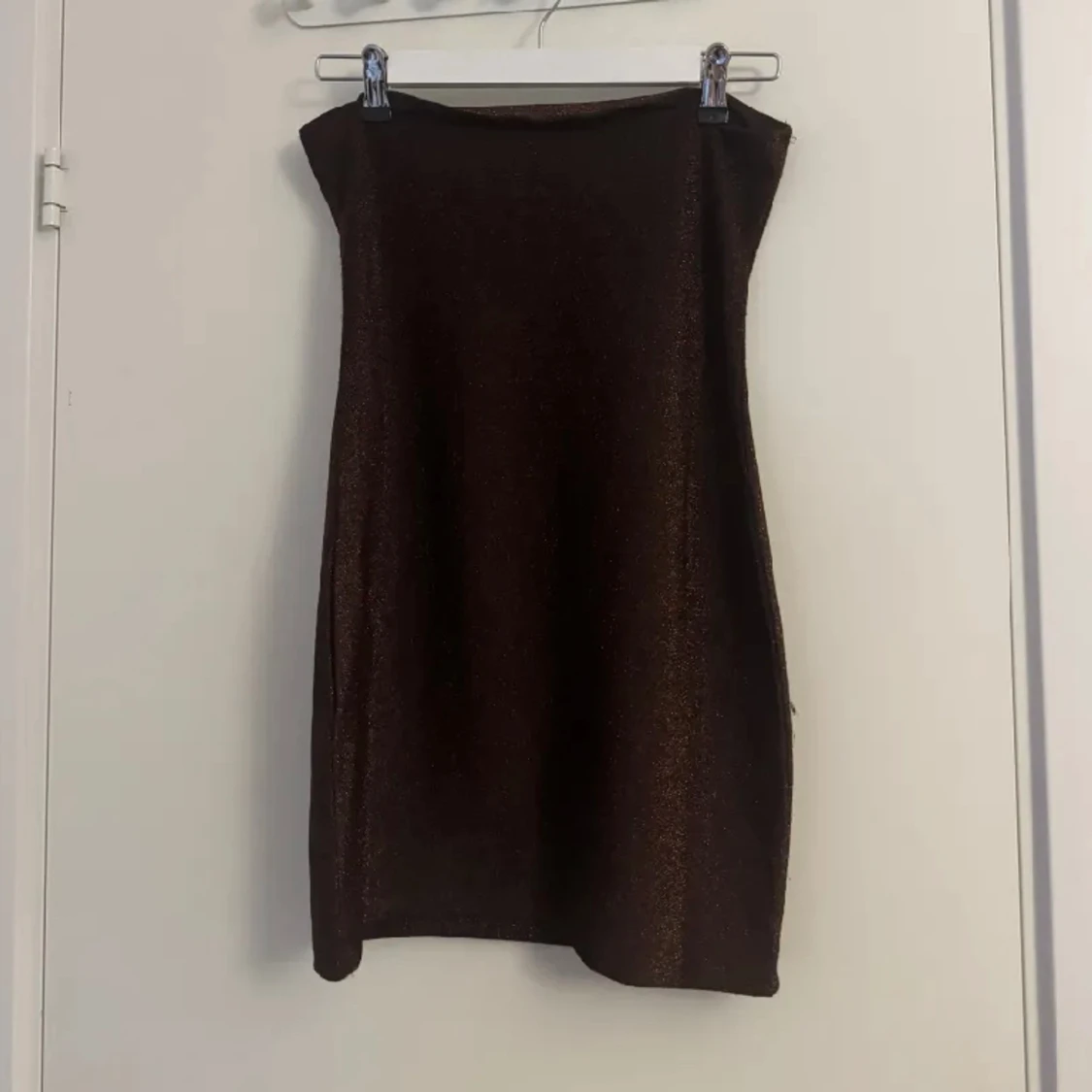 Glittrig klänning - 91