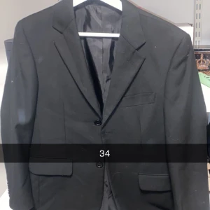 Kavaj  - Knappt använd. Köpare står för frakt 