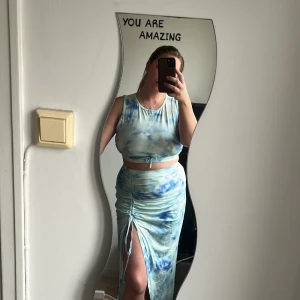 Topp & kjol - Blå melerad kjol & topp, enbart testad.