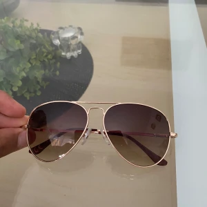 Sunglasses  - Very good looking sunglasses, that protect your eyes from UV light. 