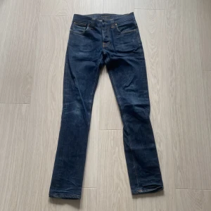 Nudie jeans  - Grim tim Skick 9-10 Strl 31/34