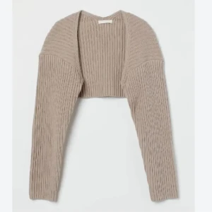 Bolero - Söt bolero med en liten defekt skriv för egna bilder. Det är den ’vita/offwhite inte den bruna som visas i den Första bilden 