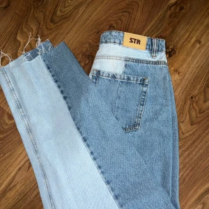 STR jeans - STR jeans till salu, storlek 40 Nyskick 10/10 Ingen användning för de ej passa Tveka inte att höra av dig vid fundering/frågor !  