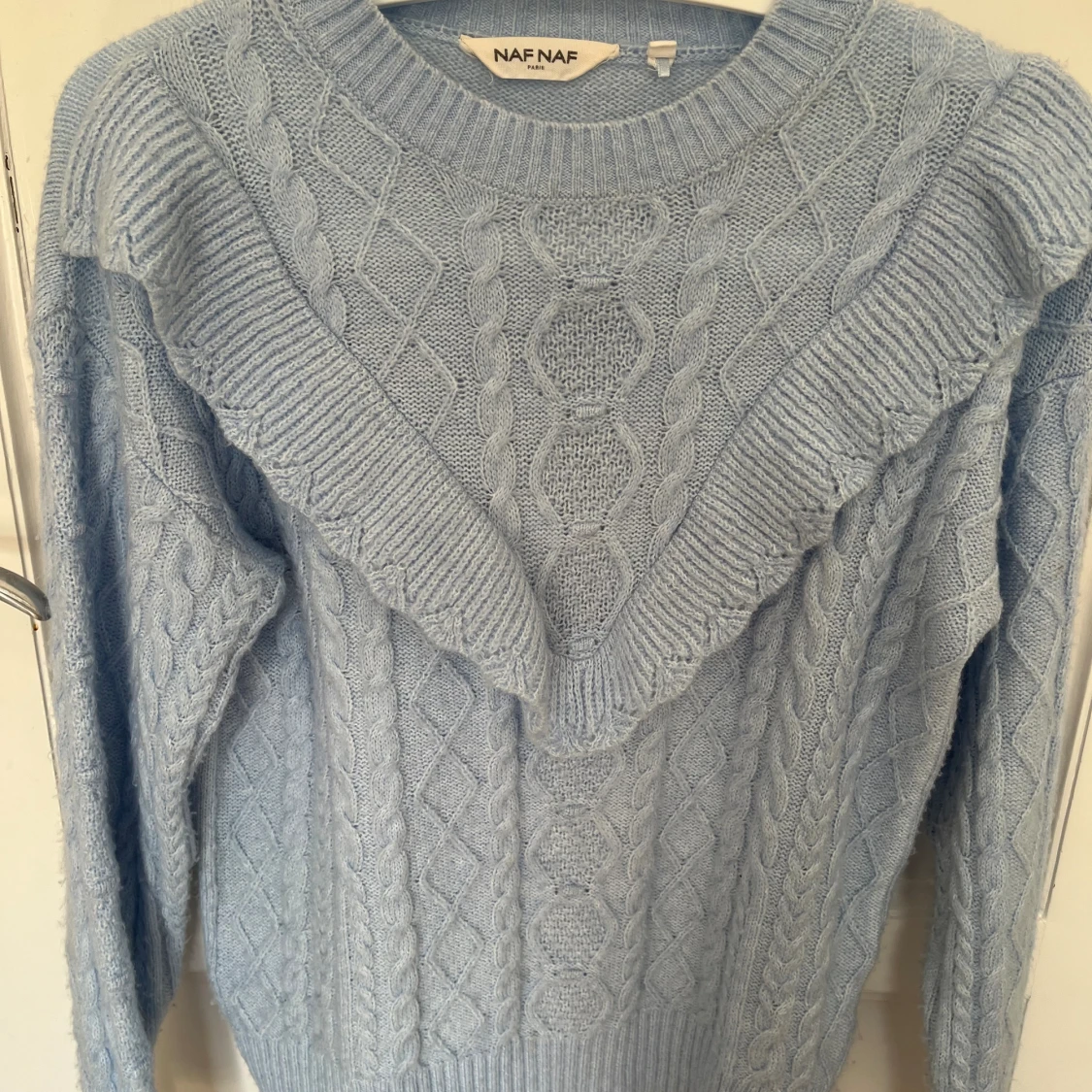 Stickad volang tröja - 90