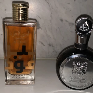 Lattafa  - Två riktigt fina kloner från Lattafa. En by the fireplsce klon och den andra ysl y EDP. Båda är nästan helt nya 