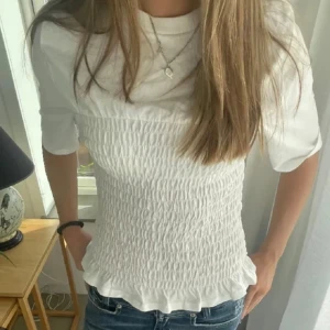 Smockad topp hm - Helt ny med lappen kvar (första bilden är lånad)