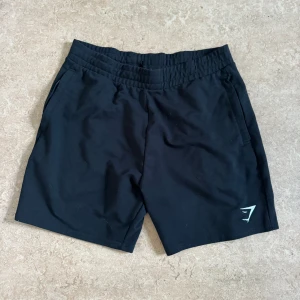 GYMSHARK nyskick träningsshorts! - Ett par Gymshark shorts som endast är använda 2-3 gånger. Dragkedjefickor