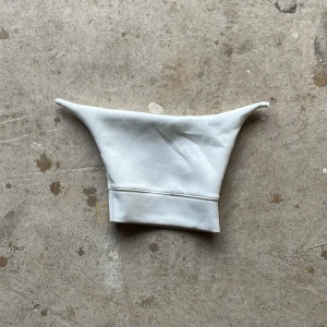 Gummy Beanie - Made from a sweater, this piece showcases bunny-like ears creating a unique look 