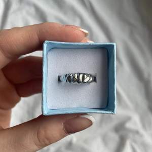 justerbar silver ring från olympia rings. oanvänd. 80kr + frakt