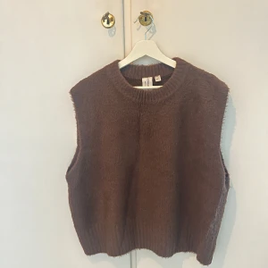 Brun väst - Fin brun väst.