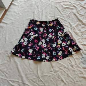 Mini skirt from Only size M  New without tags  Dark blue floral  80% Viscose 20% Nylon