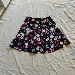 Mini skirt from Only size M  New without tags  Dark blue floral  80% Viscose 20% Nylon