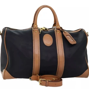 Christian Dior Boston väska - Ursprung: Italien  Material: PVC-läder  Tillbehör: nyckel, lås, namnskylt och axelrem