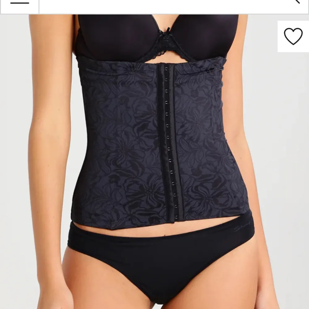 Super snygg korsett från maidenform! Använd några fåtal gånger och är i toppen skick! Nypris: 449kr.. Toppar.