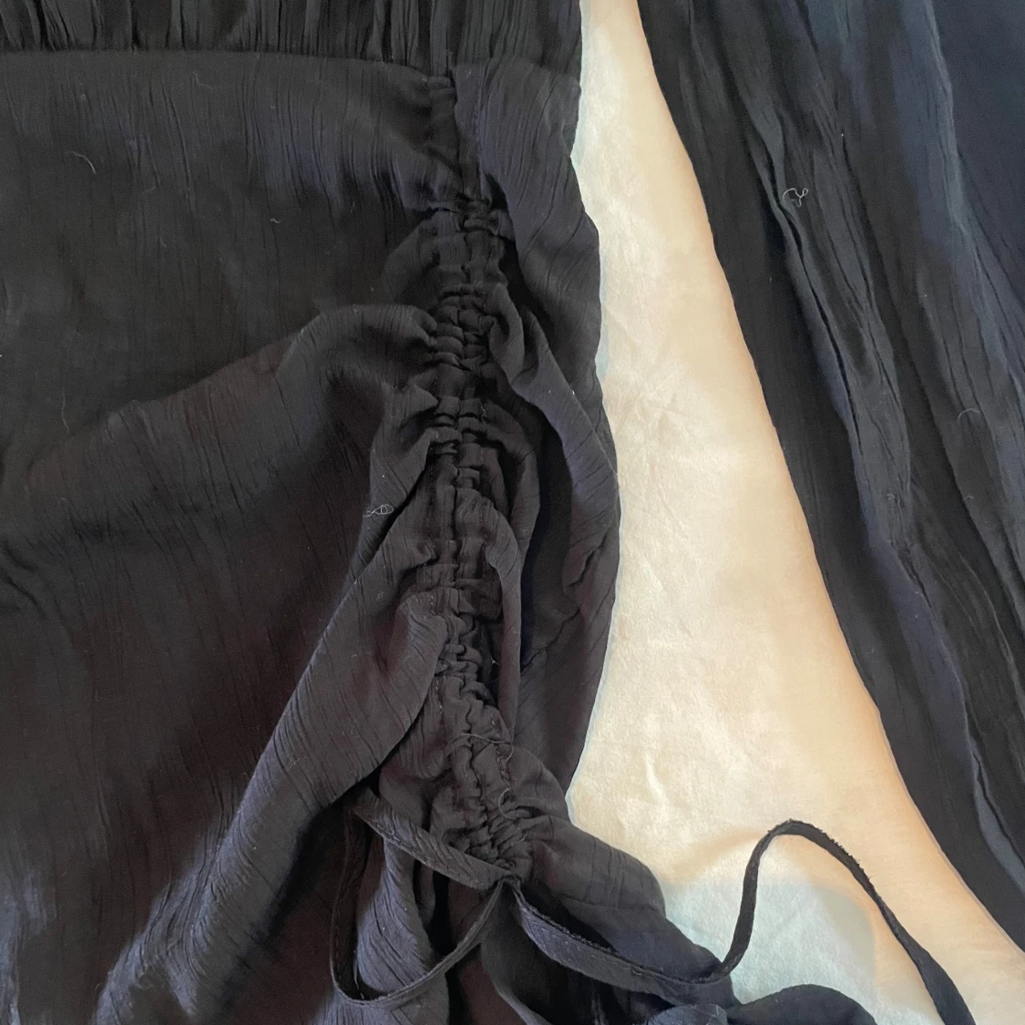 Svart kortare klänning - 90