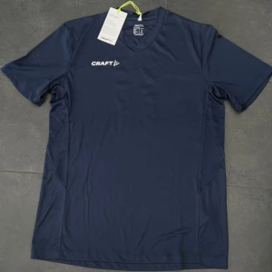 Sport T shirt - Ny med pris lapp på