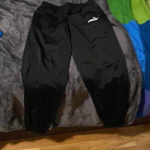 Puma byxor  - 170 storlek aldrig använda 