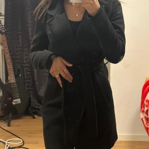 Kappa - Kappa från Veromoda. Jättefin det finns även band till den. Den är supervarm och knappt andvänd