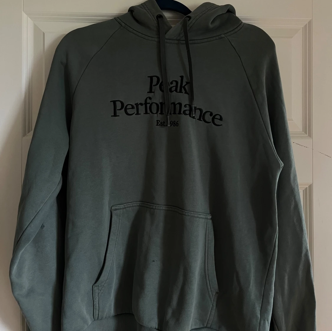 Peak performance huvtröja