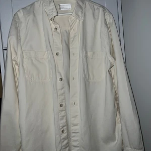 Tyg Jacka  - Använd vid ett fåtal tillfällen som ny. 