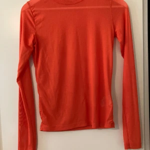 Meshtröja  - Orange långärmad meshtröja