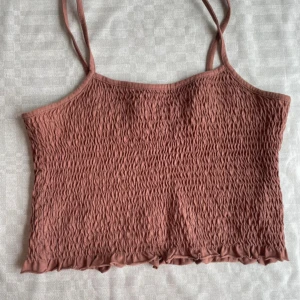 Brun crop top - Väldigt strechigt crop top. 