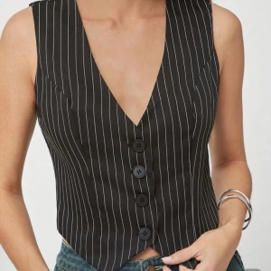 Randig väst - Använd en gång