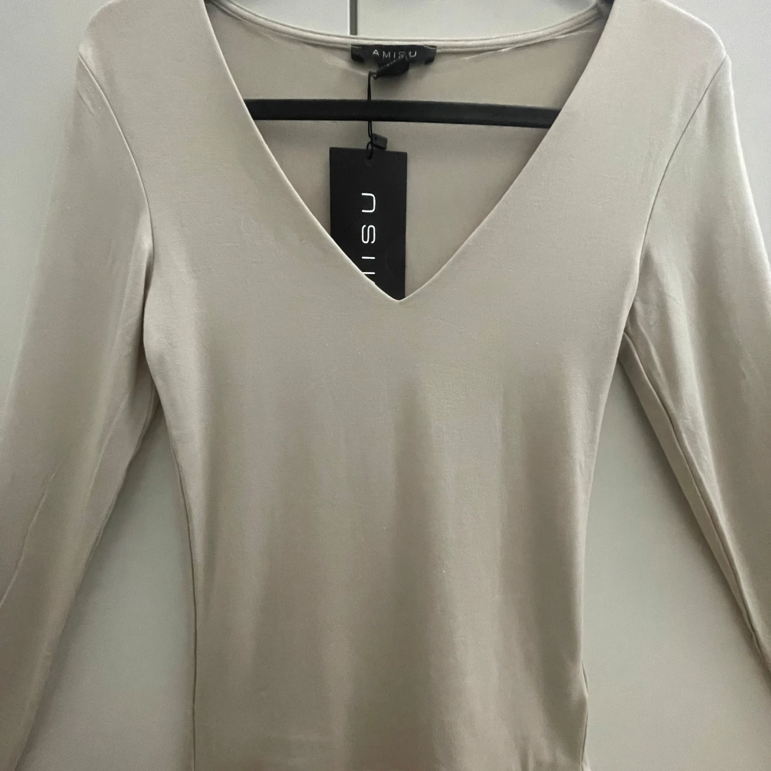 Beige långärmad v neck topp