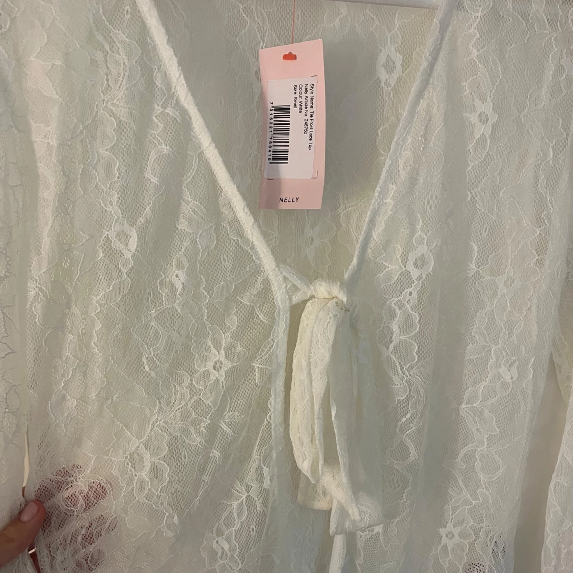 Vit spetstopp med knyt från Nelly - 1