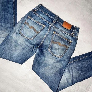 Nudie jeans - Nudie jeans | Modell Grim Tim | Super fint skick | Storlek W29 L32. 