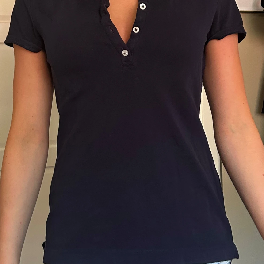 Mörkblå piké från H&M  - 2