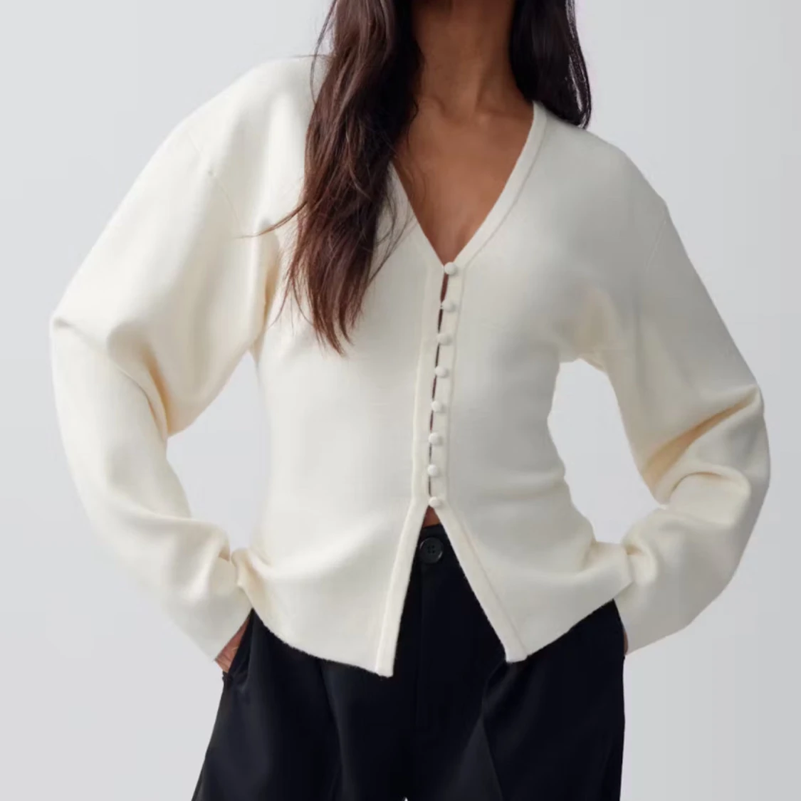 Vit kofta med knappar från Gina Tricot