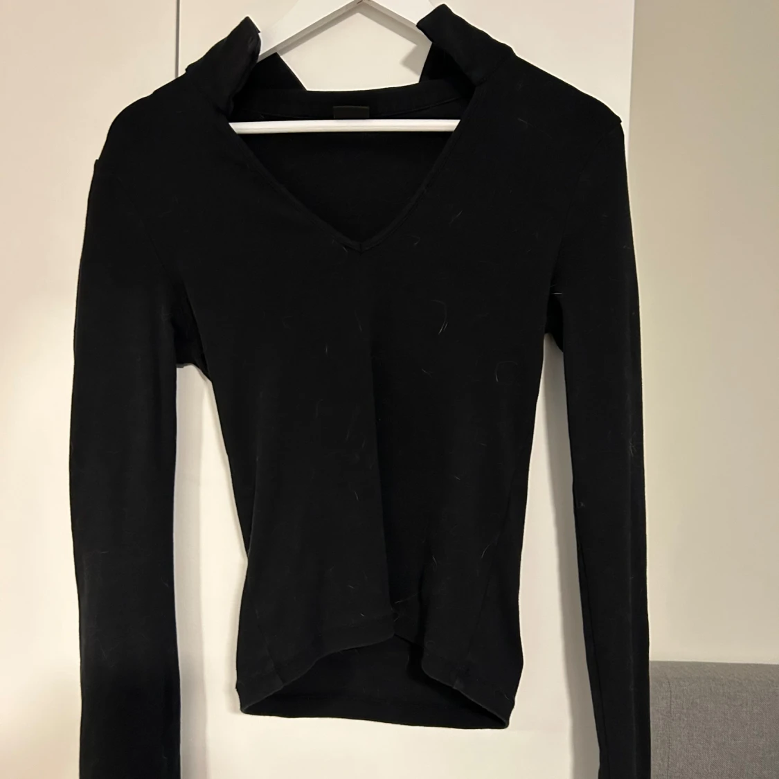 Svart v-ringad långärmad topp