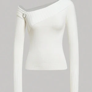 Biały top z długim rękawem i klamrą - Sprzedam stylowy biały top z długim rękawem, kwadratowym dekoltem i ozdobną klamrą na ramieniu. Top ma ściągacze przy mankietach i ładnie leży na ciele. Idealny do stylizacji z dżinsami lub spódnicą!