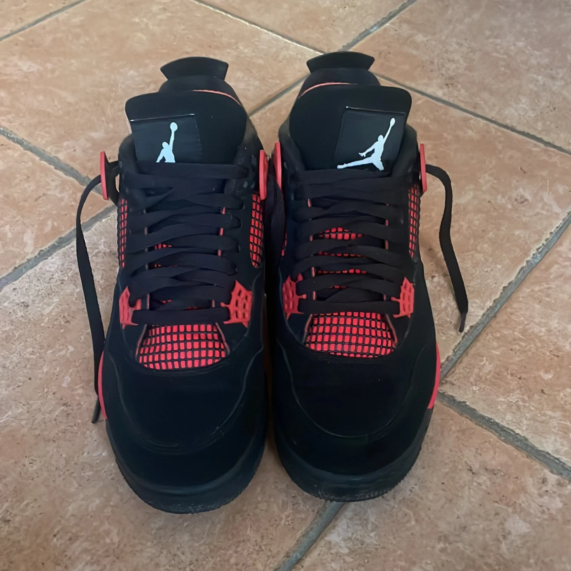 Jordan 4s retro red 