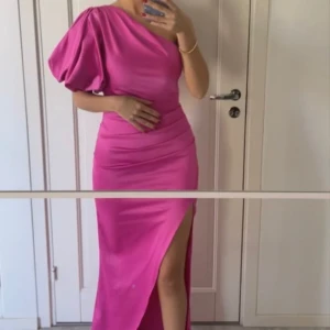 Rosa balklänning  - Aldrig använd endast testad 