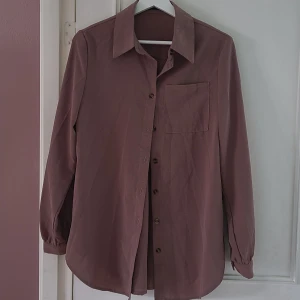 Ljusrosa/beige skjorta! - Fin passform.