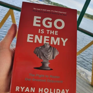 Ego Is The Enemy By Ryan Holiday - "Ego Is the Enemy by Ryan Holiday – A powerful guide to mastering humility, discipline, and purpose in a world driven by ego. Drawing on timeless wisdom and real-life examples, this book is a must-read for anyone pursuing personal or professional growth. In great condition, gently read." 